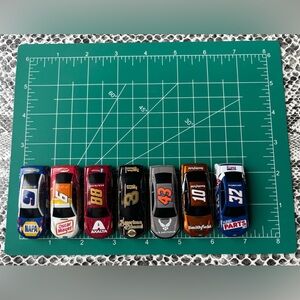 Lot of 7 Lionel Racing NASCAR Die Cast Cars scale 1:64 including Earnhardt
